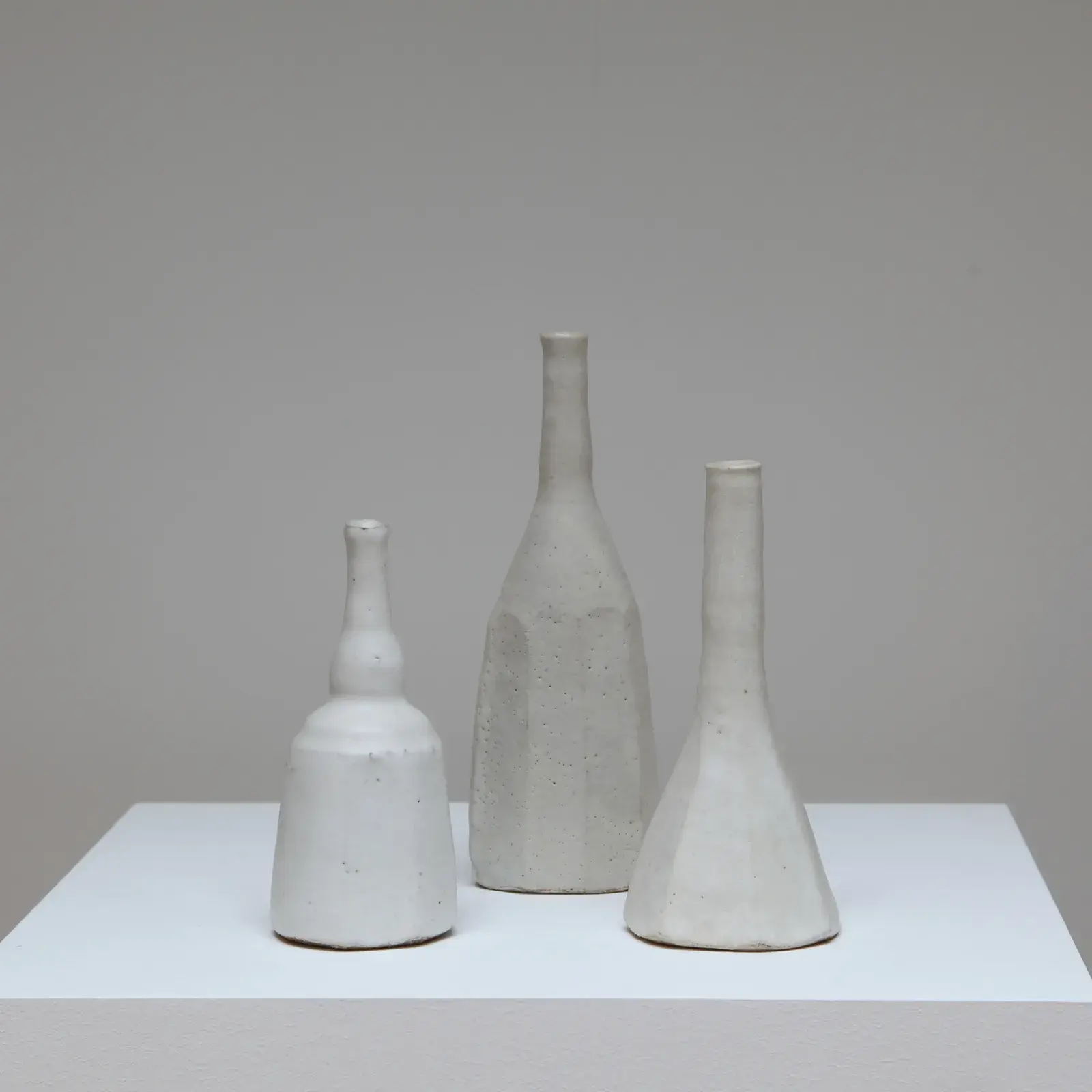 Three Morandi still life bottles